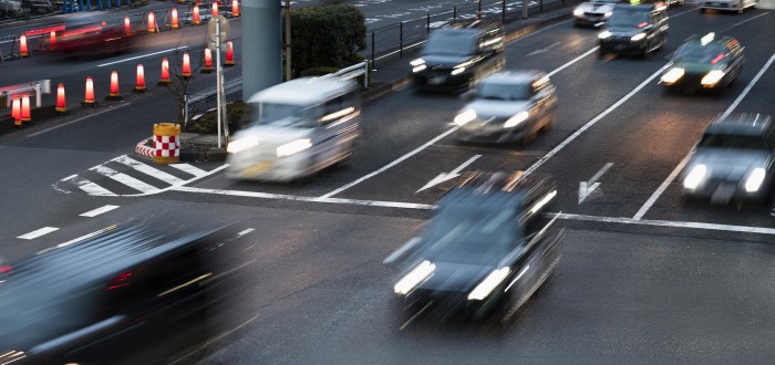 people-driving-cars-city-street